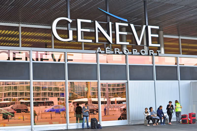Group arriving in an airport terminal at the start of a ski trip